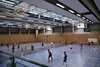 Unisporthalle innen während Kurs Badminton