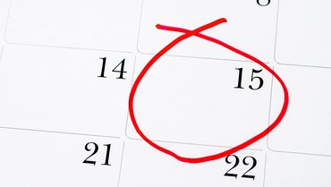 Kalender auf dem ein Datum rot eingekreist ist.